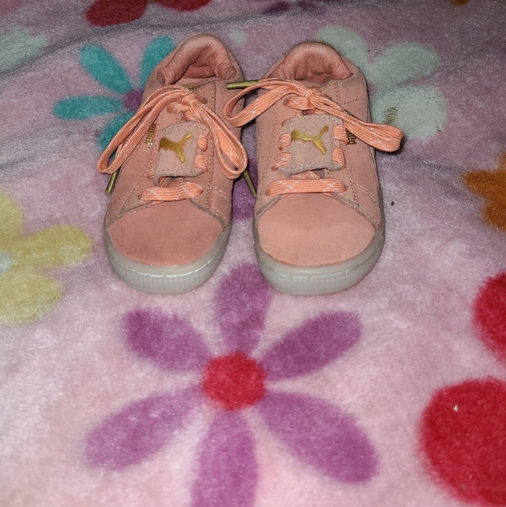 Orange puma sneakers